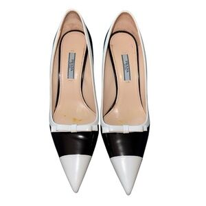 Prada Black Leather Pointed Toe Pumps with White Trim and Bow Accent